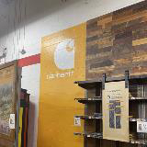 advertisement in yellow wall