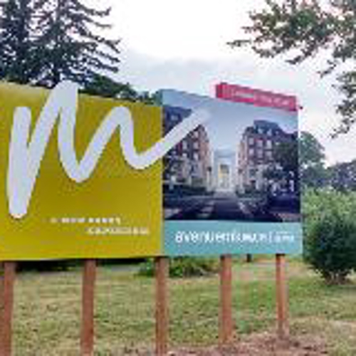 AvenueM management signage on a property lot