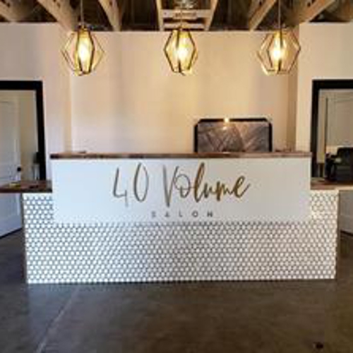 Gold 40 volume signage on the desk