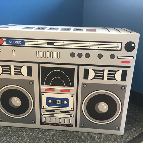 Boombox graphic design on the corner of the room