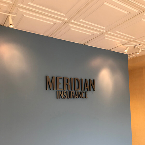 Meridian Insurance logo in the blue wall