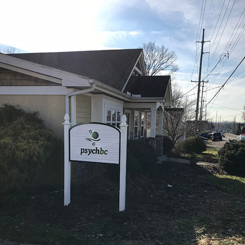 White signage with psychbc logo outside the house