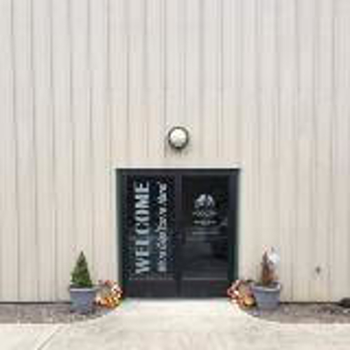 Custom sign on the door of the building