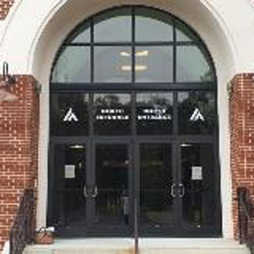 Custom sign on the door of the building