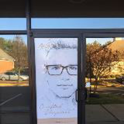 Image of a man on the door