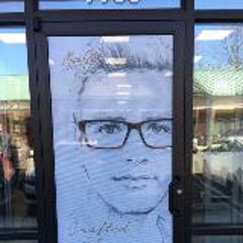 Image of a man on the door