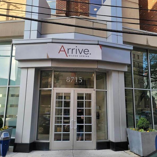 Arrive custom signage on the building