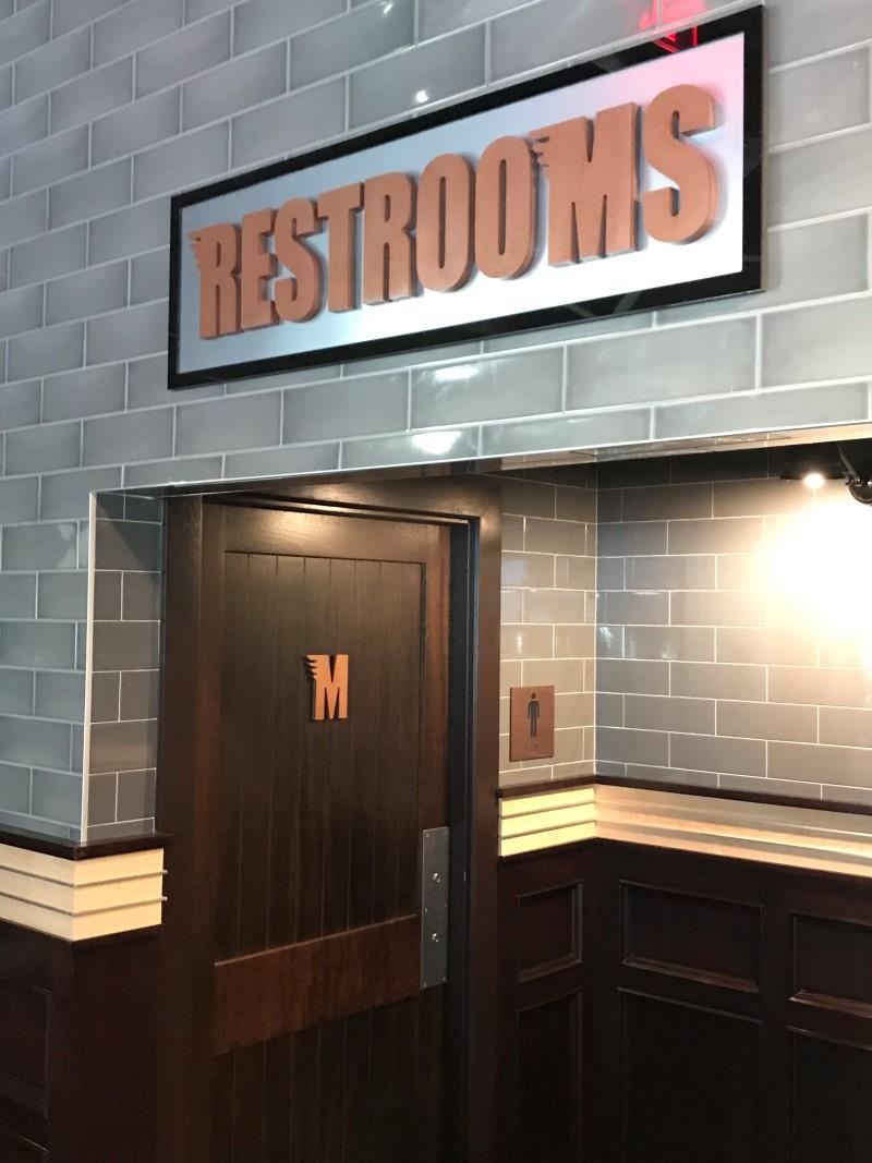Maggie McFly's Restrooms Sign