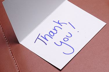A small card has "Thank you!" written on it