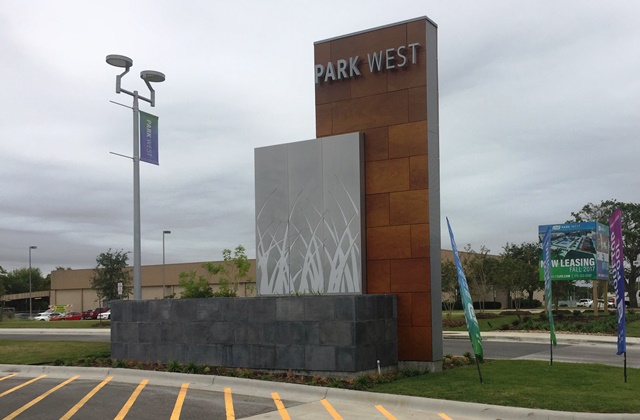 Park West uses modern styles to advertise their monument sign