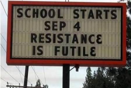 A school sign references a Star Trek line with its reminder that school is starting soon