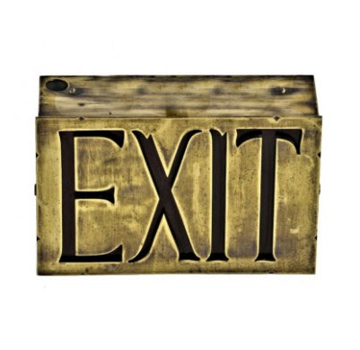 An Exit sign that appears to be very old