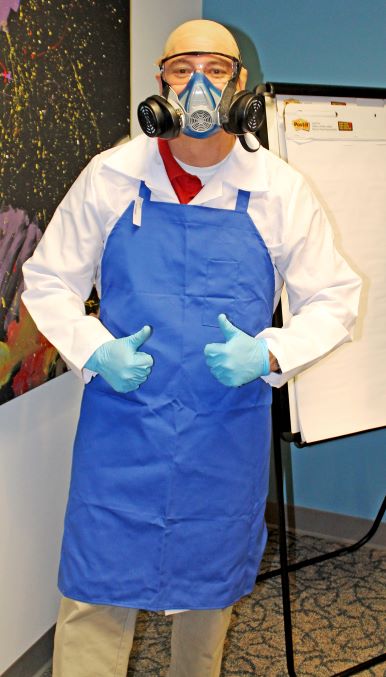 man dressed up as a lab scientist