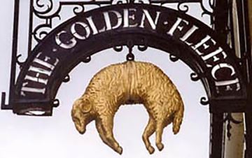 A sign for the Golden Fleece pub