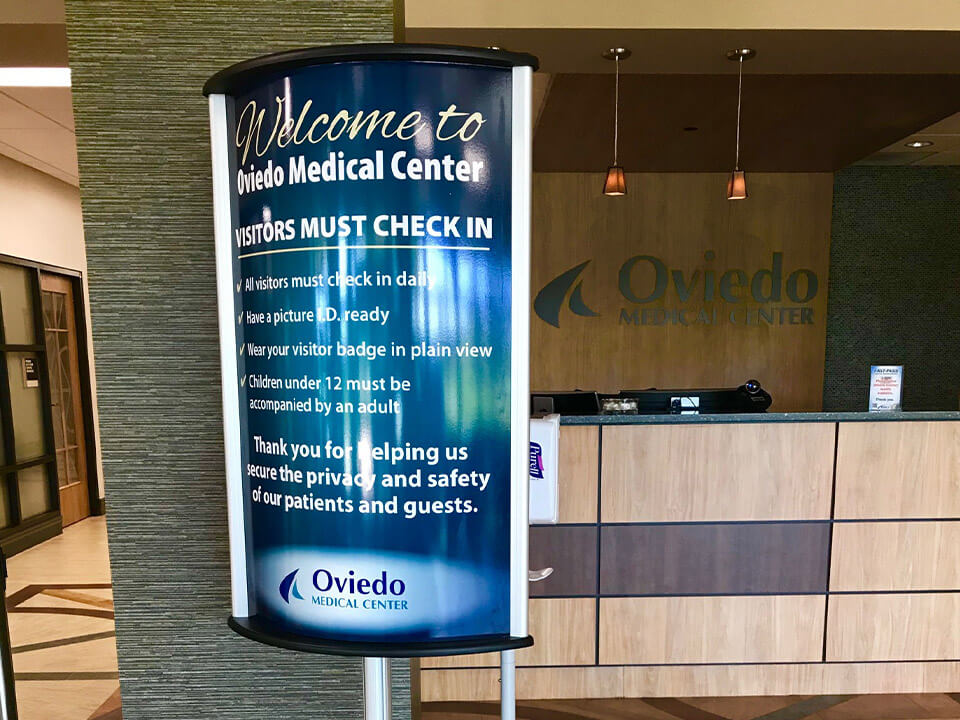 Oviedo Medical Center visitor check in sign
