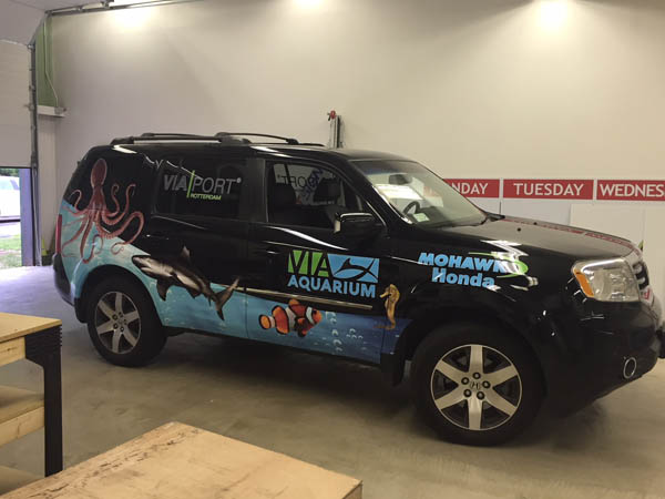 The VIA Aquarium car wrap