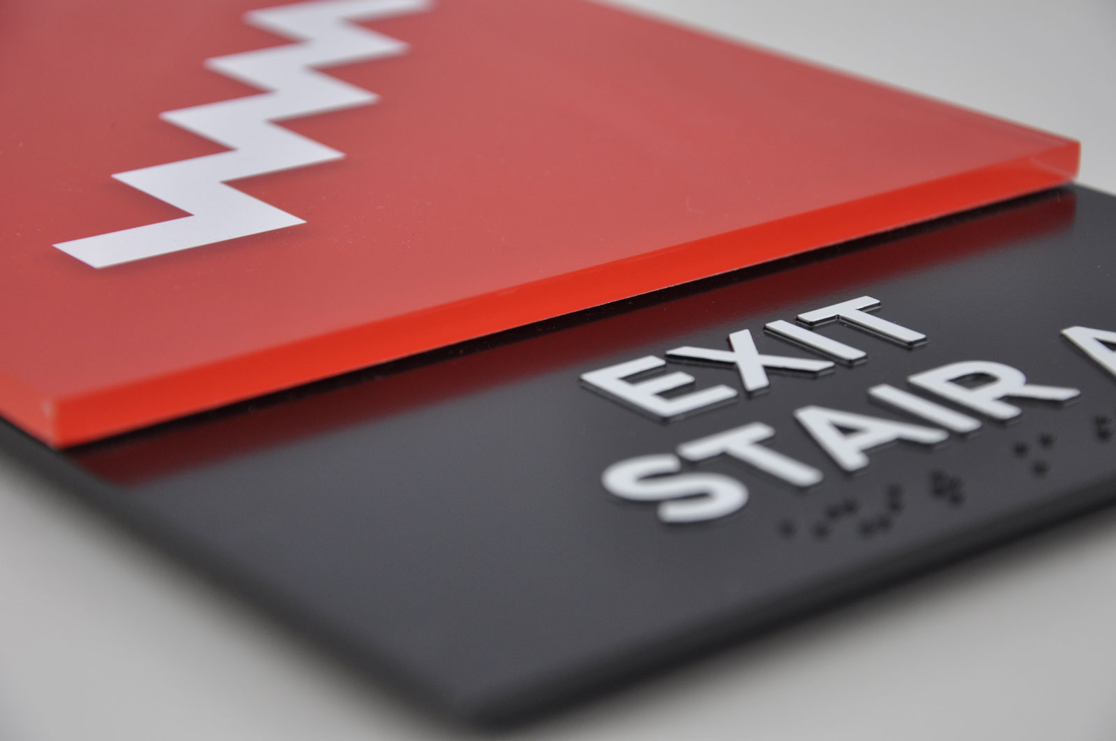 An “Exit Stairs” custom wall sign installed in an office building by FASTSIGNS in Mount Pleasant, Wisconsin