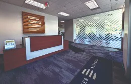 wooden paneling signage in an office setting