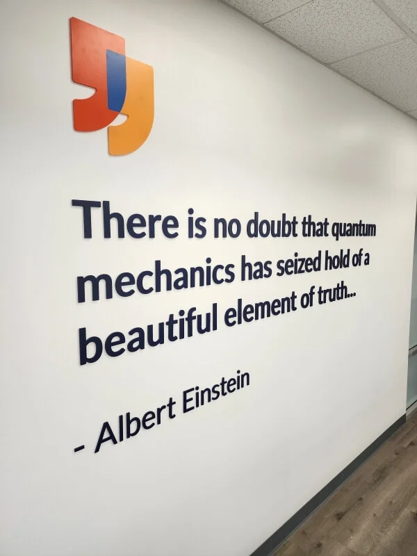 An image of a wall graphic of an Albert Einstein quote.