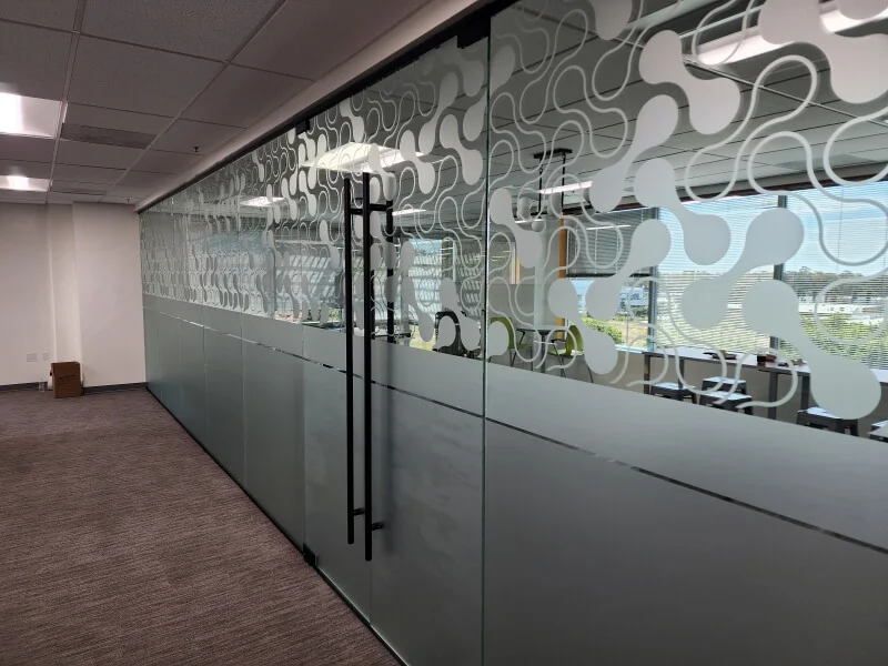 An image of the interior frosted and etched window and door graphics for an office.