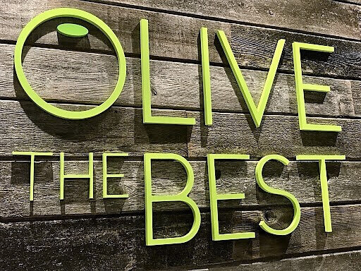 Olive The Best signage