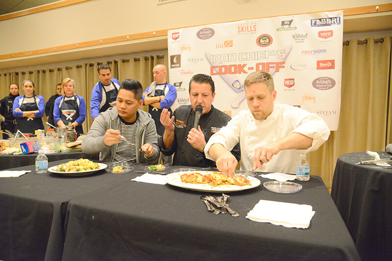 Judges taste the foods cook by the competing team