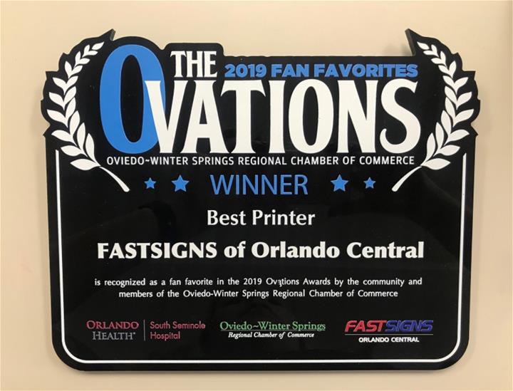a plaque names FASTSIGNS of central Orlando as a fan favorite best printer