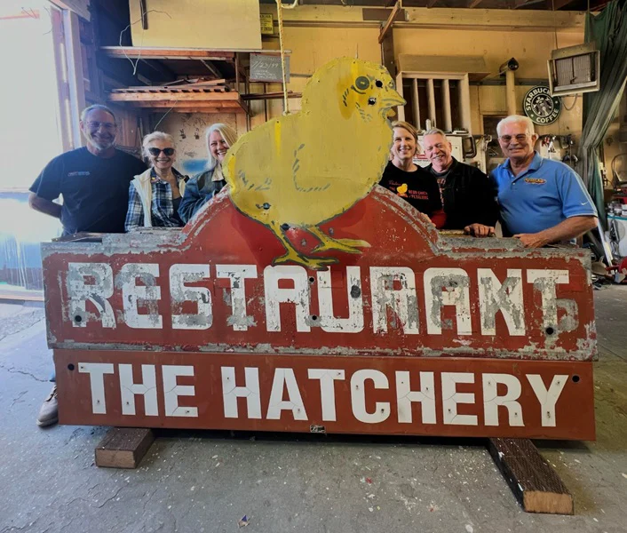 An image of the restaurant's signage in the warehouse.