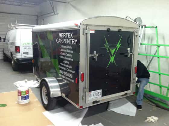 a trailer with vehicle graphics