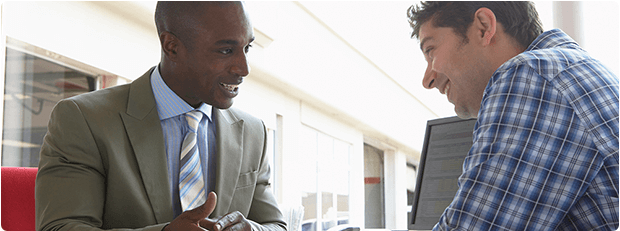 two men in a meeting