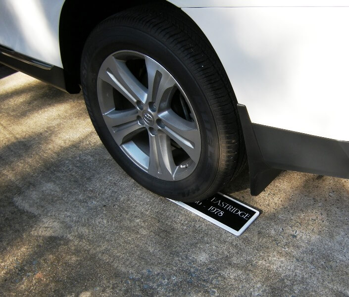 car tire running over marker to show durability